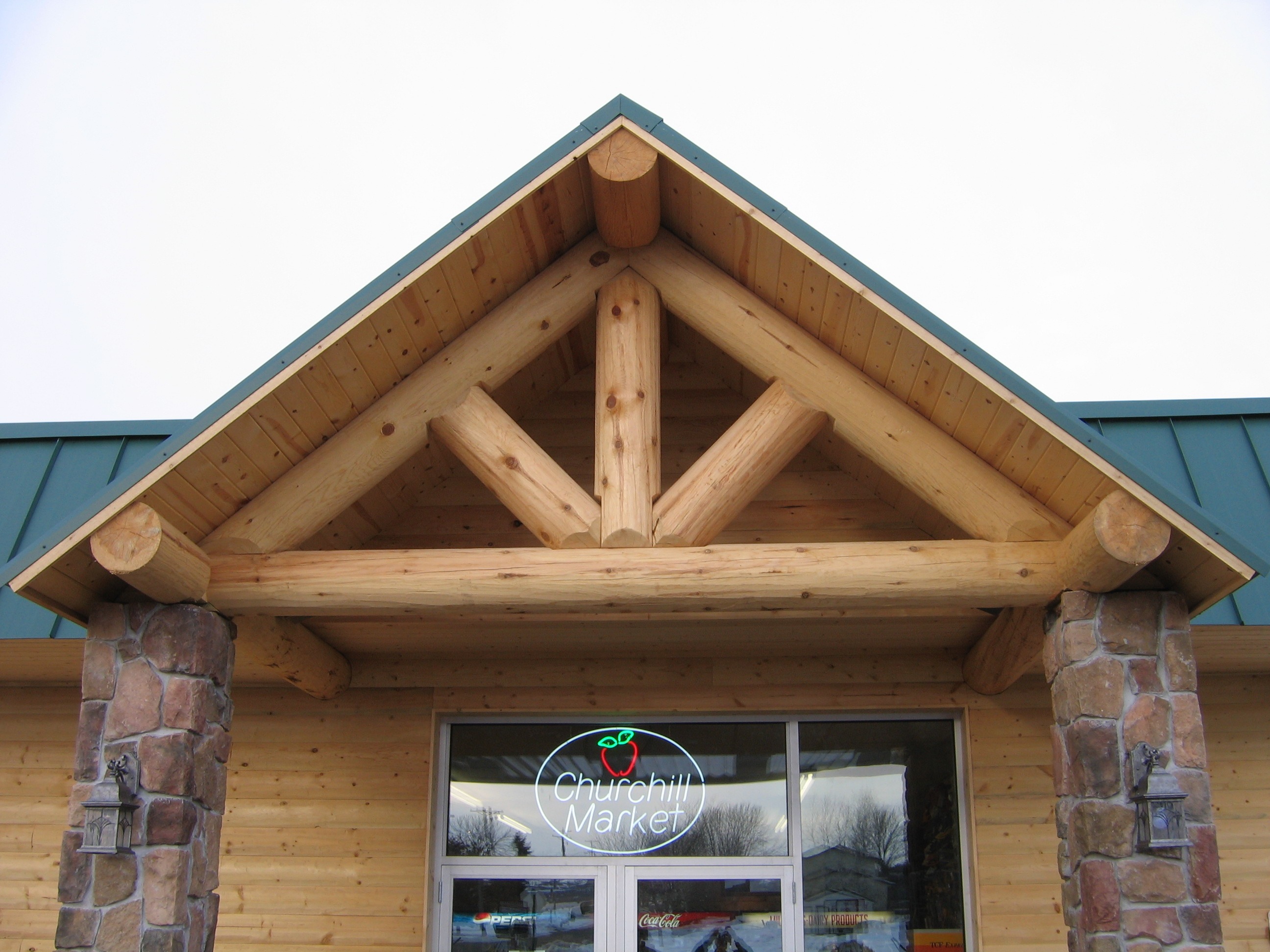 Custom timber store entrance arch