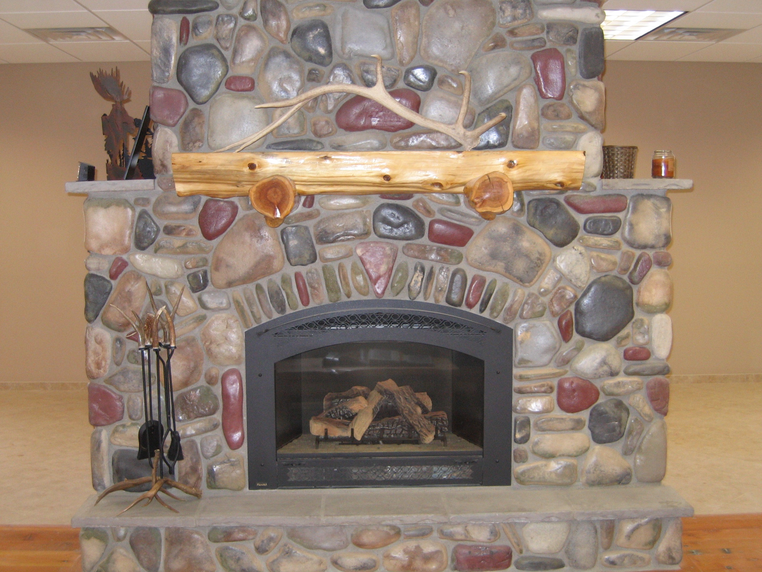 Rustic mantel shelf over a fireplace