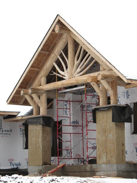 Custom wood truss and entryway support beams