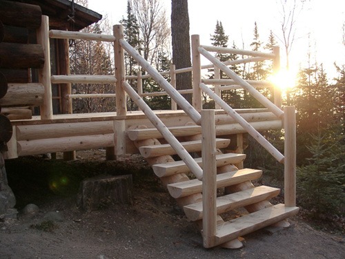 Outdoor porch and stairs made from timber logs | Outdoor stair railings