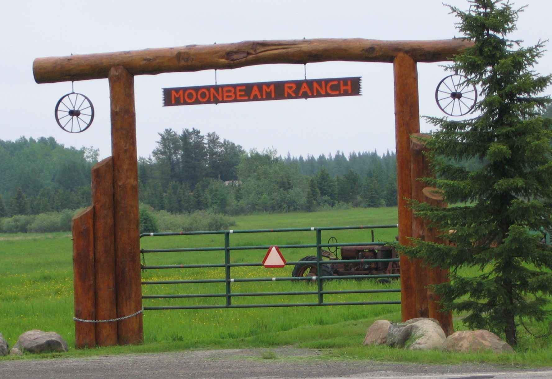 Moonbeam Ranch entrance arch made from timber logs