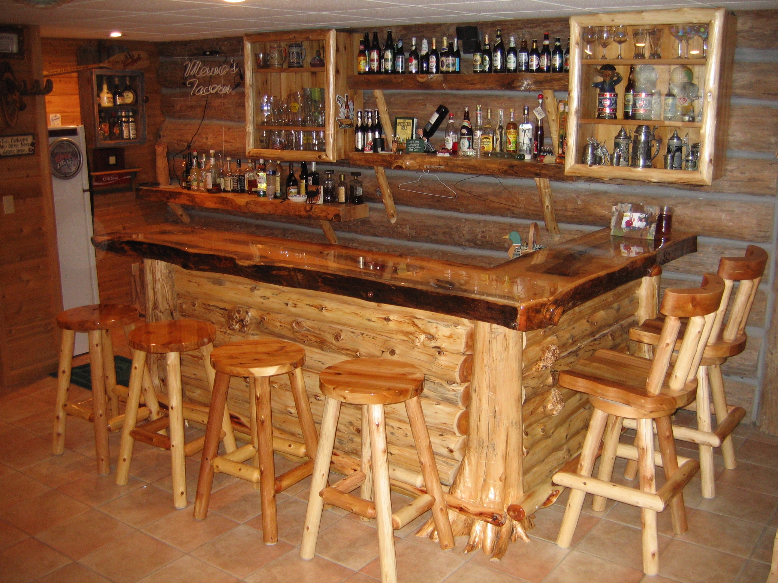 Custom wood bar and stools by Ryan's Rustic Railings