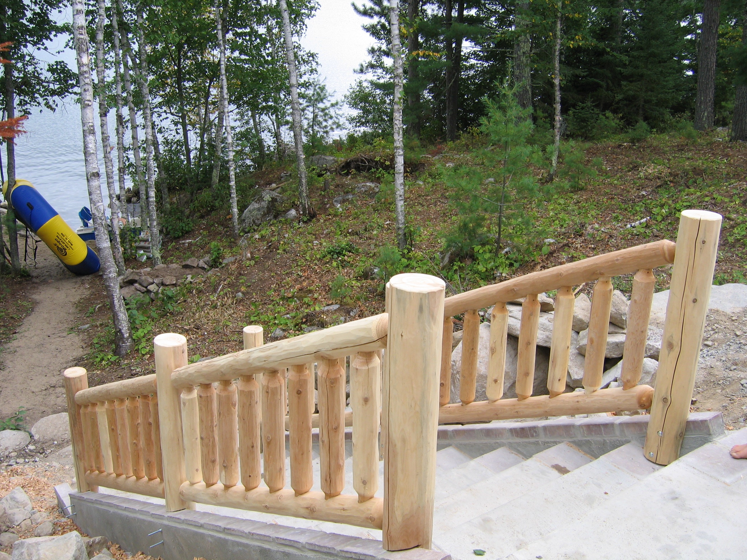Lake access wood railing staircase | outdoor stair railings