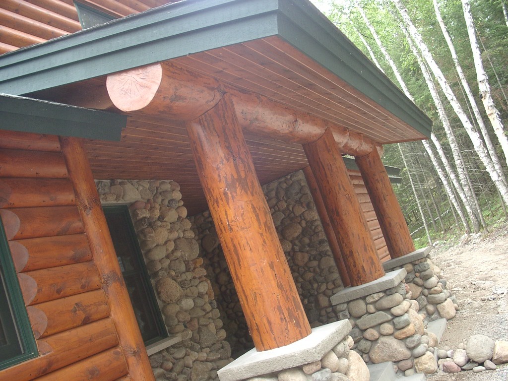 Timber entrance awning and support columns