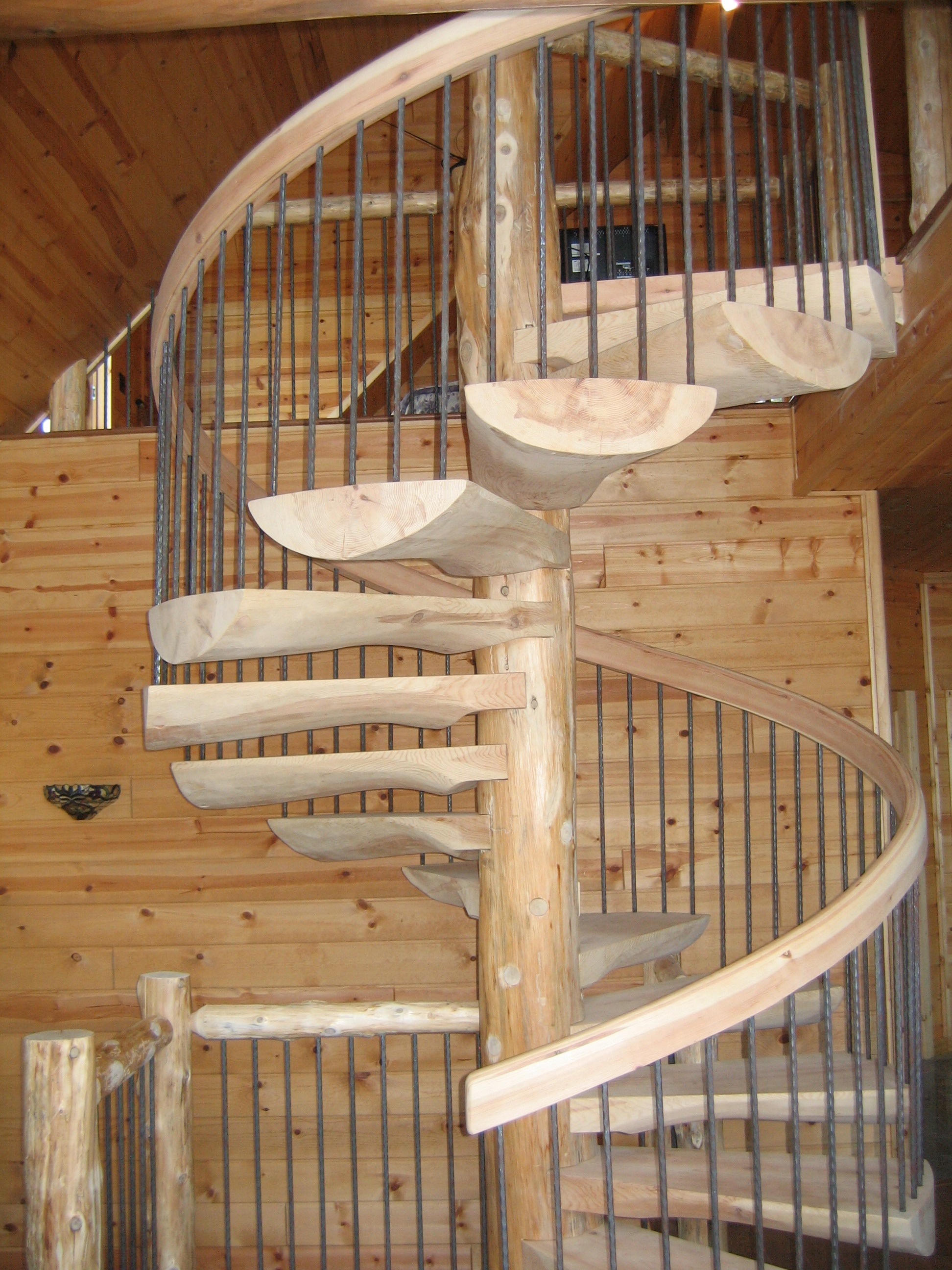 Wrought Iron Baluster with Natural Cedar Railings | Spiral Staircase