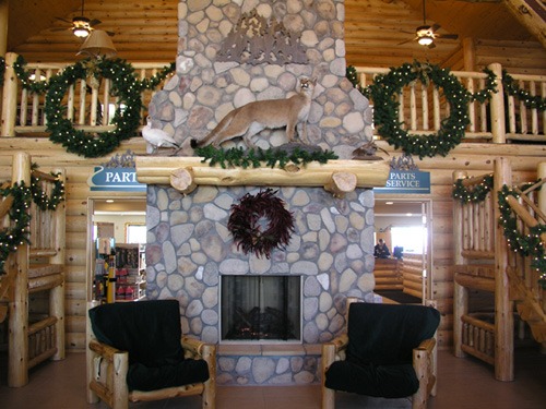 Wood cabin with custom stone fireplace