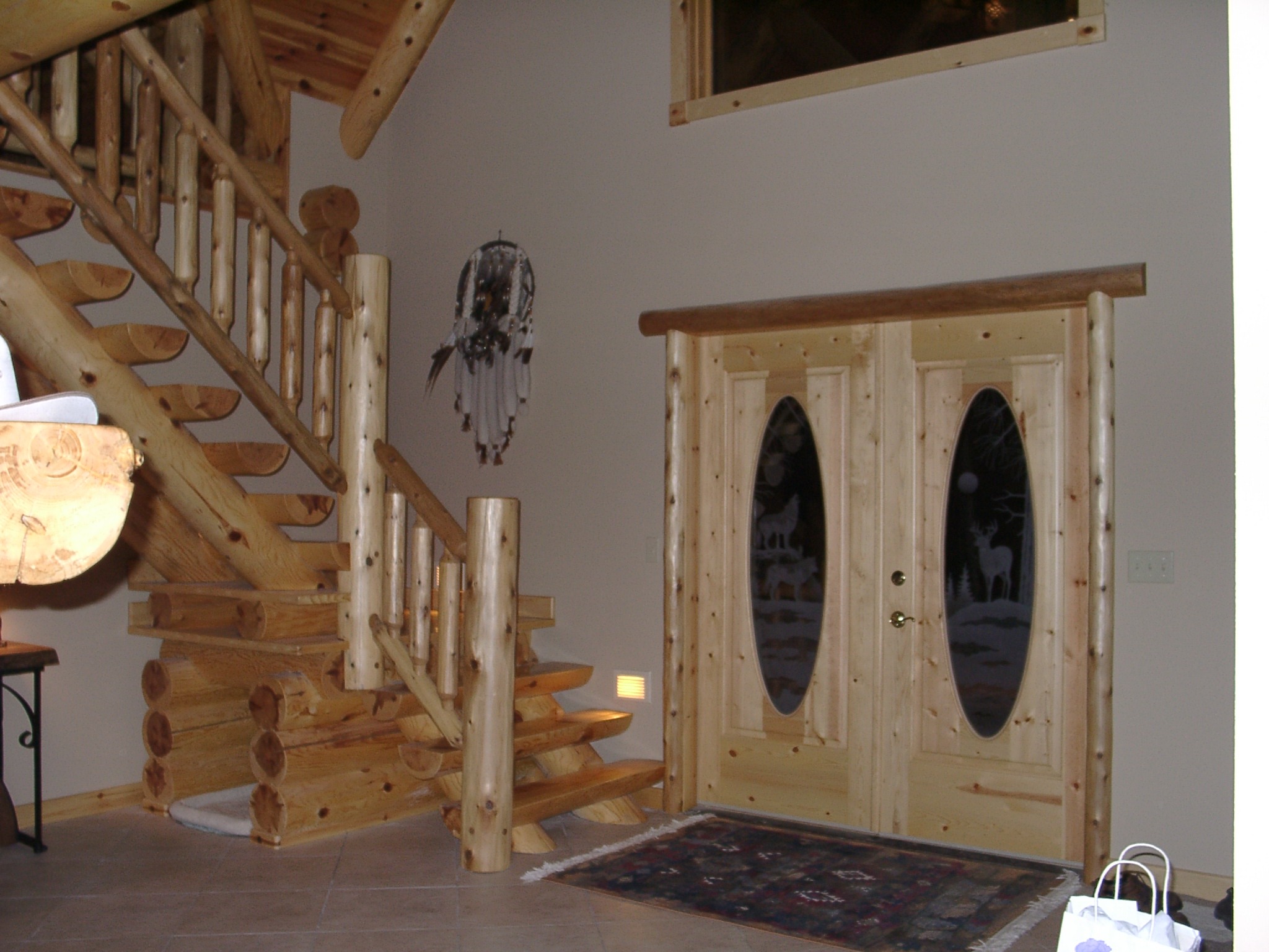 Custom wooden front doors with nature glass inserts | Wood Stair Railings
