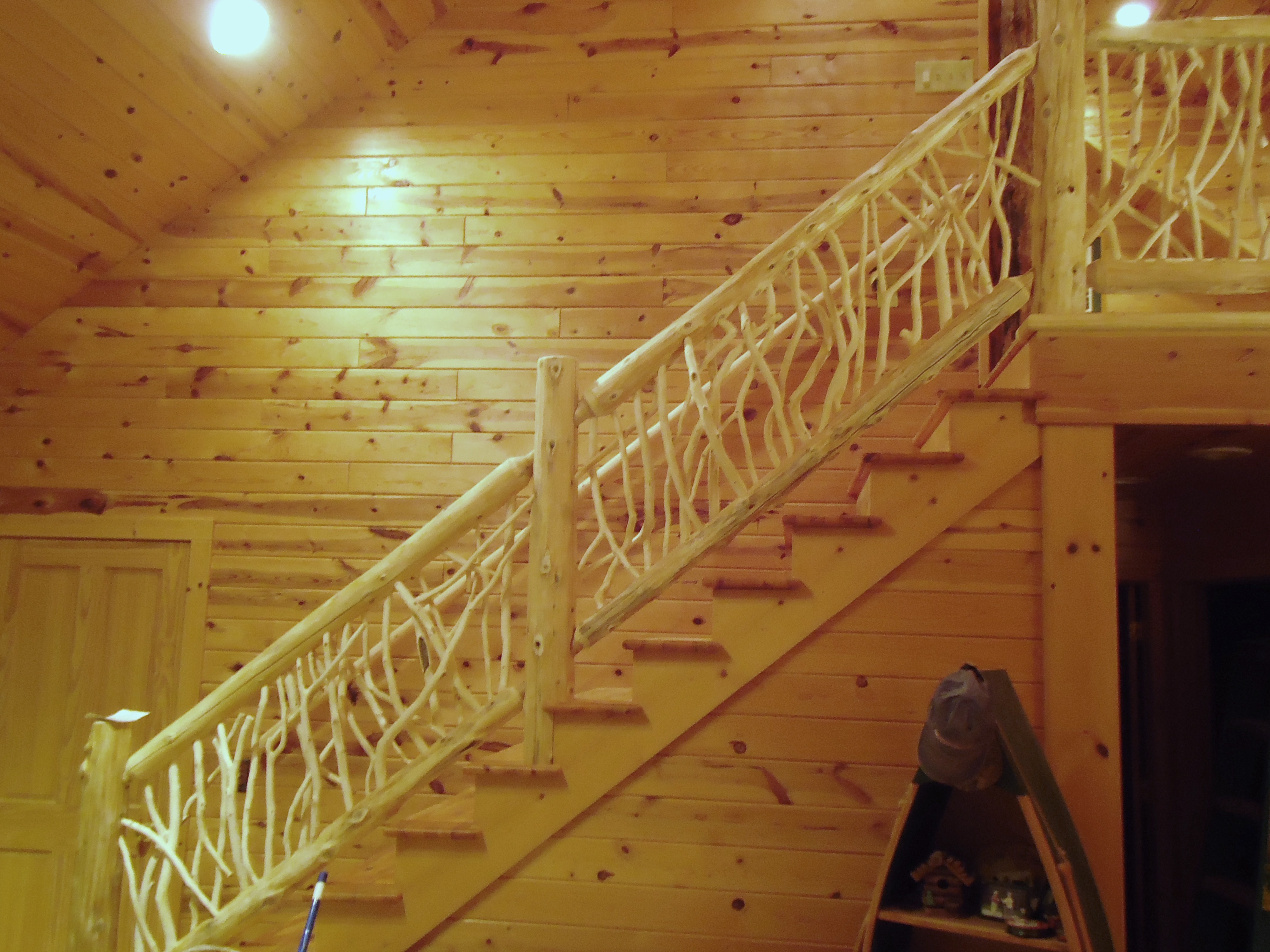 custom natural wood staircase by Ryan's Rustic Railings | Wood Stair Railings