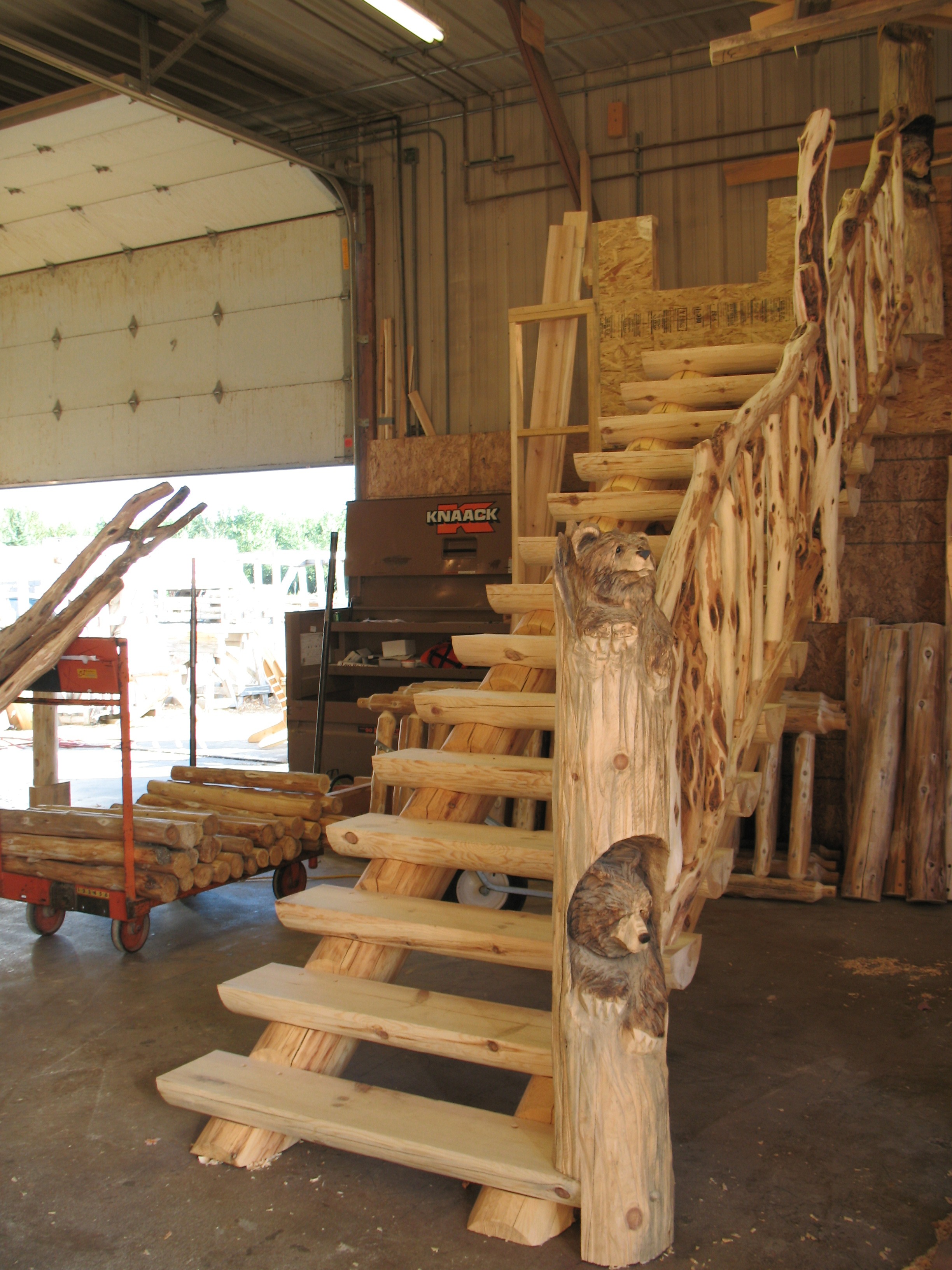 Custom carved bear staircase post | Wood Stair Railings